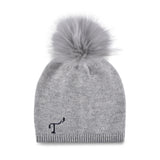 Women's gray, cashmere, knitted, beanie with light gray faux fur pom top and navy, embroidered T3 logo.