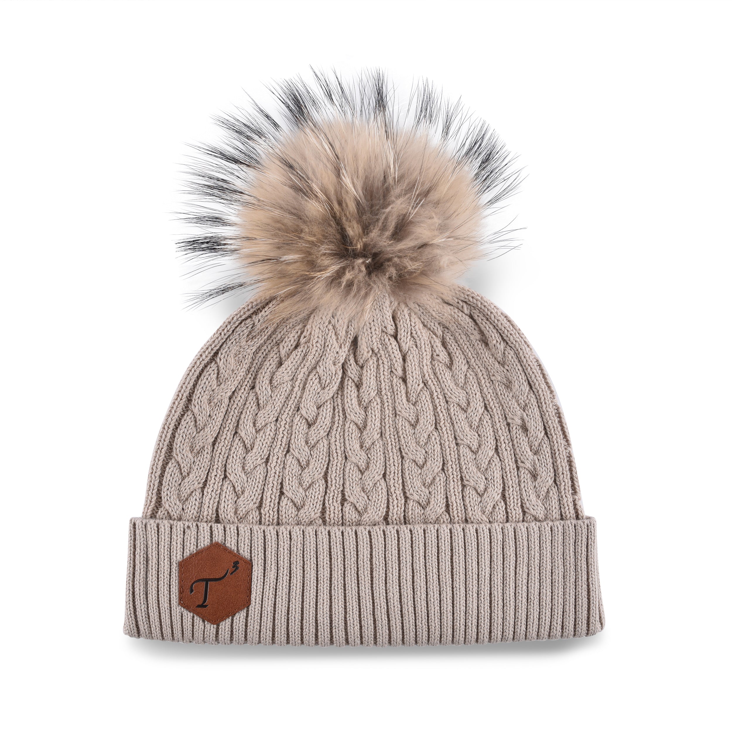 Women's beige, cotton, knitted, beanie with light brown fur pom top and brown, leather, hexagonal patch on the brim with debossed T3 logo.