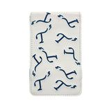 White leather golf yardage book cover with navy embroidered T3 logo in a random pattern.