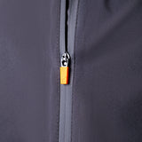 Close-up of a zipper on a dark gray jacket with an orange zipper pull.