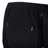 Close-up of black pants with a pocket on a white background