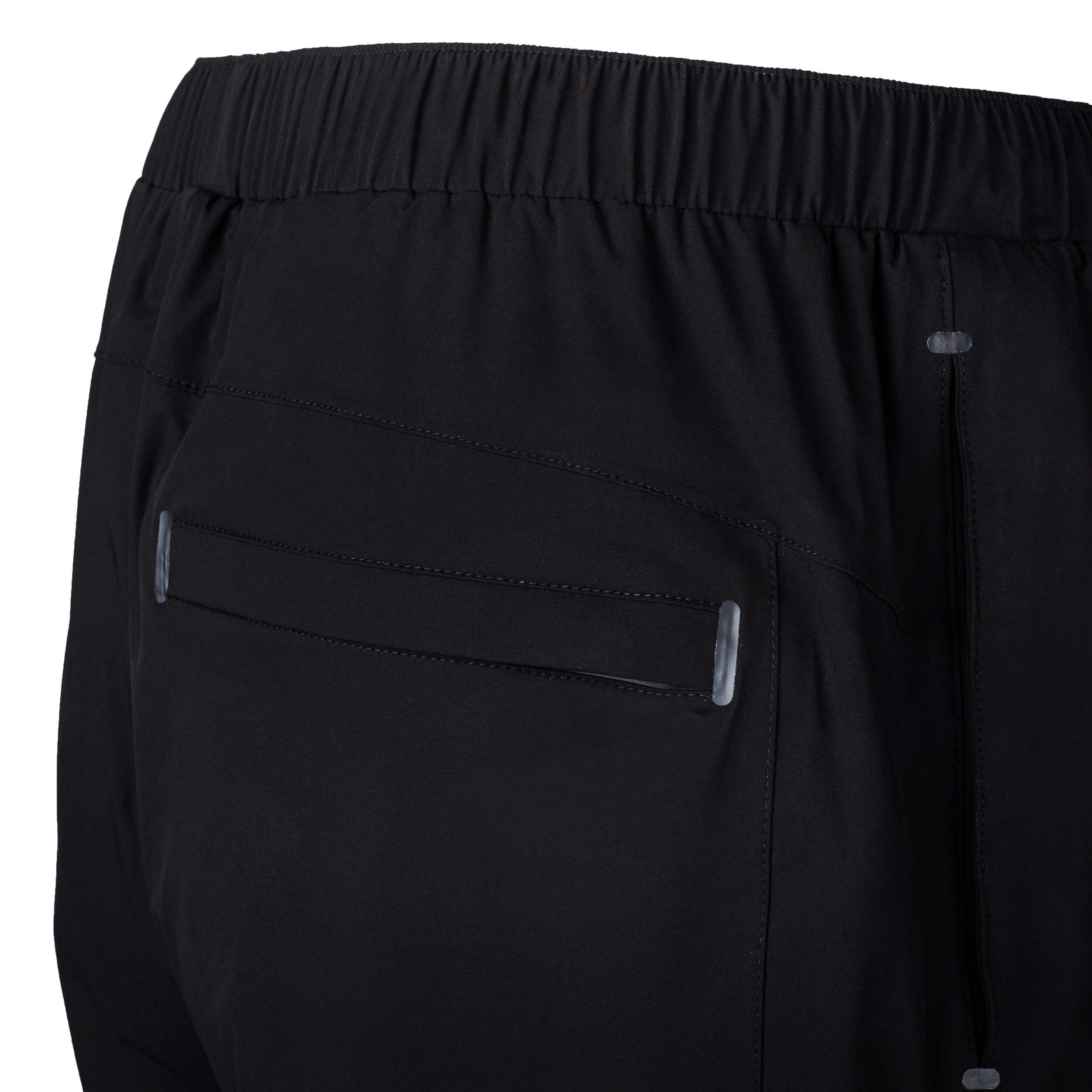 Close-up of black pants with a pocket on a white background