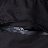 Close-up of a back pant pocket with an open zipper