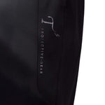 Close up of black T3 Protective Gear logo on pant leg