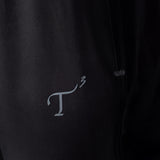 Close up of T3 logo on pant fabric