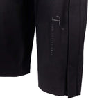 Close up of black T3 Protective Gear logo on black pant leg