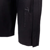 Close up of black T3 Protective Gear logo on black pant leg