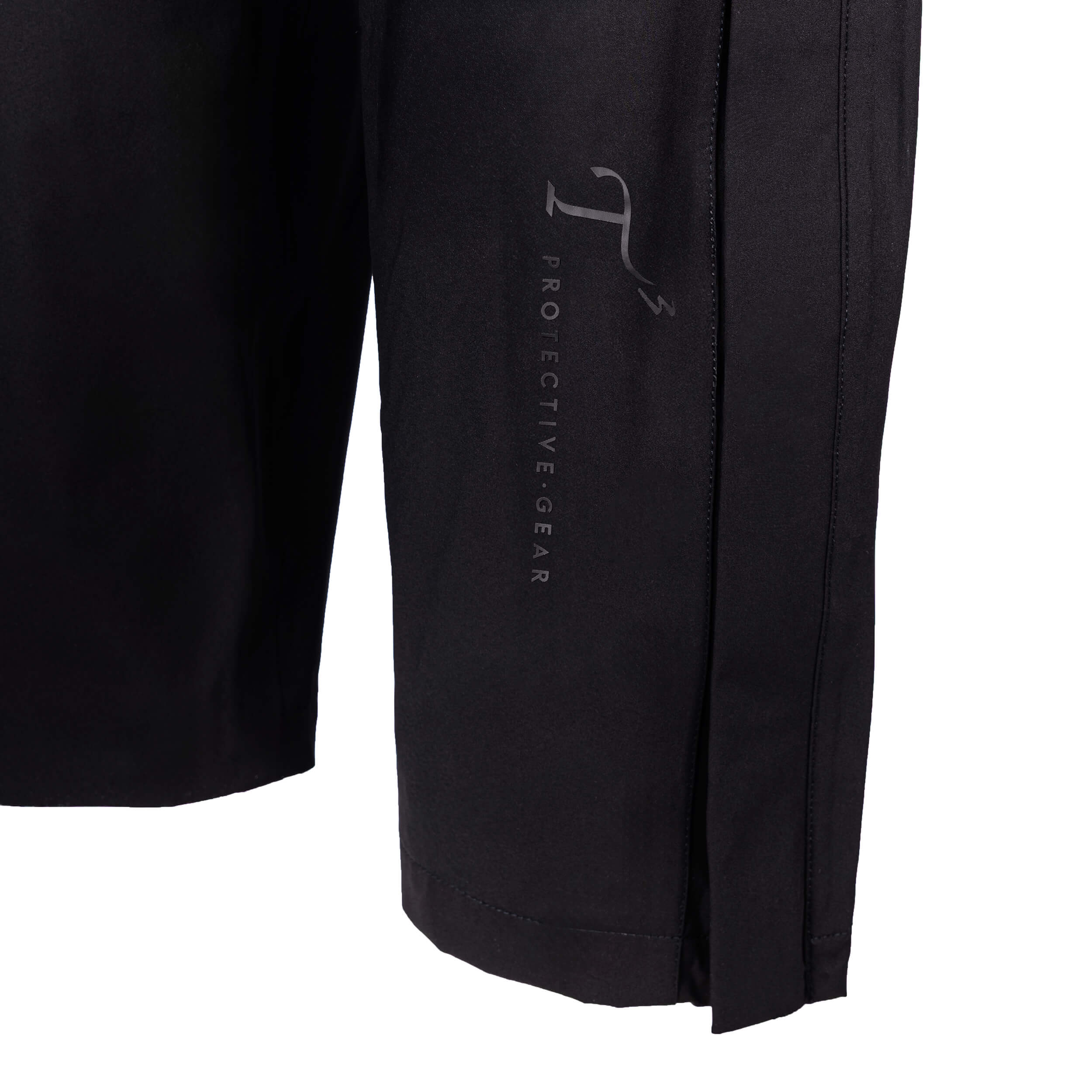 Close up of black T3 Protective Gear logo on black pant leg