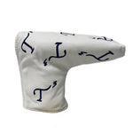 White leather blade putter head cover with navy embroidered T3 logo in a randomized pattern
